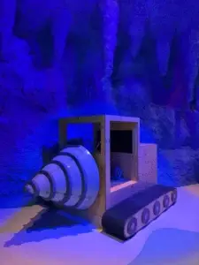 The Drill interactive exhibit — a large pedal-powered cave drill at Nickelodeon Play Istanbul