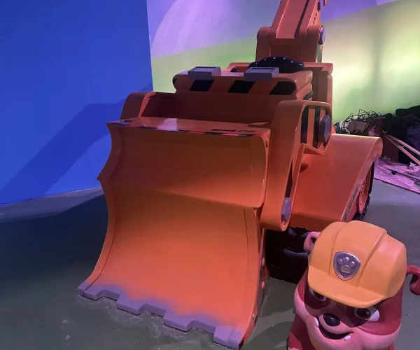 Detail of a hand-sculpted paw-themed car in the Paw Cars exhibit