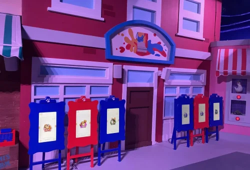 Art Store exhibit storefront with six coloring easels