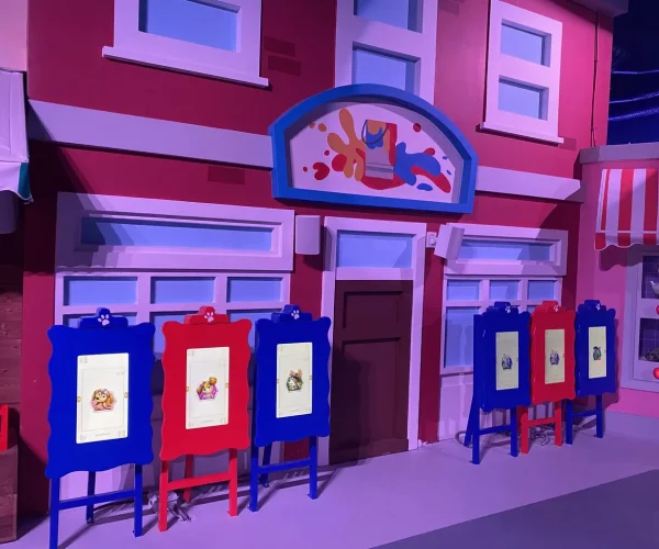 Art Store exhibit storefront with six coloring easels