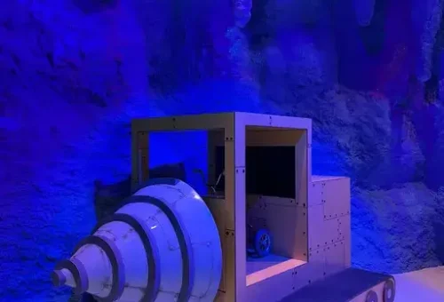 The Drill interactive exhibit — a large pedal-powered cave drill at Nickelodeon Play Istanbul