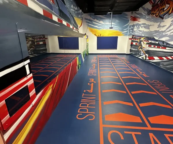 Olympic Sprint exhibit — a 10-metre video-wall racetrack with a touch scree