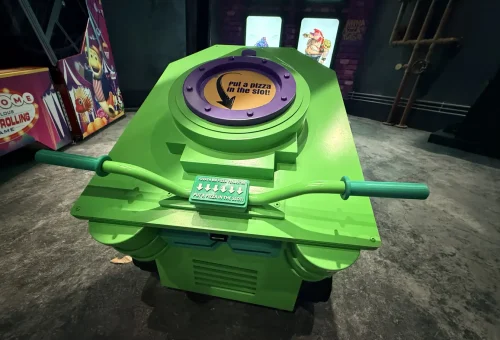 Child playing the interactive Pizza Shooter game