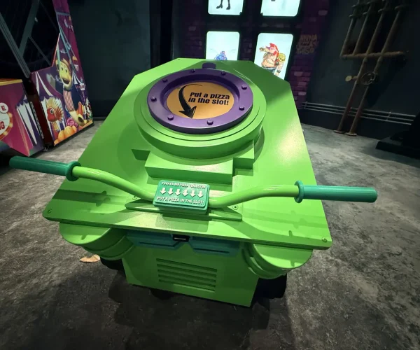 Child playing the interactive Pizza Shooter game