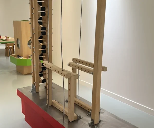 Skyline Construction exhibit — drilled wooden blocks with plastic nuts and bolts for building
